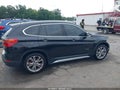 2016 BMW X1 — photo 13 of 16 | VIN WBXHT3C37GP889871