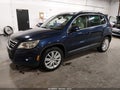 2011 Volkswagen Tiguan — photo 2 of 18 | VIN WVGBV7AX0BW520306