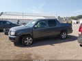 2012 Honda Ridgeline — photo 15 of 17 | VIN 5FPYK1F53CB456660