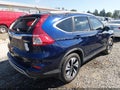 2016 Honda CR-V — photo 4 of 19 | VIN 5J6RM4H90GL050017