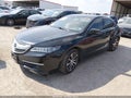 2016 Acura TLX — photo 2 of 16 | VIN 19UUB1F39GA000314