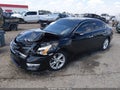 2015 Nissan Altima — photo 2 of 21 | VIN 1N4AL3AP0FC424994