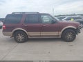 2011 Ford Expedition — photo 13 of 16 | VIN 1FMJU1H56BEF07503