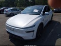2026 Tesla Model Y — photo 2 of 10 | VIN 7SAYGDED5TA471410