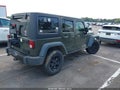 2015 Jeep Wrangler Unlimited — photo 4 of 16 | VIN 1C4BJWDG2FL600543