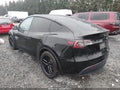 2023 Tesla Model Y — photo 3 of 20 | VIN 7SAYGAEE5PF604571