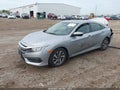 2018 Honda Civic — photo 2 of 16 | VIN 19XFC2F71JE039500