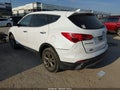 2014 Hyundai Santa Fe — photo 3 of 16 | VIN 5XYZT3LB9EG131538