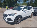 2018 Hyundai Santa Fe — photo 2 of 17 | VIN 5NMZTDLB9JH052828