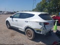 2018 Hyundai Santa Fe — photo 3 of 17 | VIN 5NMZTDLB9JH052828