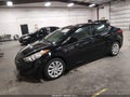 2013 Hyundai Elantra — photo 2 of 16 | VIN 5NPDH4AE0DH204561