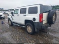 2009 Hummer H3 — photo 3 of 12 | VIN 5GTEN13E298110205