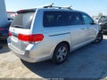 2010 Honda Odyssey — photo 4 of 16 | VIN 5FNRL3H90AB084987