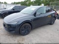 2026 Tesla Model Y — photo 2 of 21 | VIN 7SAYGDEE5TF531648
