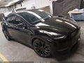 2021 Tesla Model Y — photo 1 of 15 | VIN 5YJYGDEF4MF137730