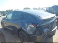 2026 Tesla Model Y — photo 13 of 17 | VIN 7SAYGDEE1TA638192
