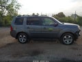 2012 Honda Pilot — photo 13 of 16 | VIN 5FNYF4H5XCB015300