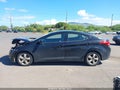 2013 Hyundai Elantra — photo 14 of 16 | VIN 5NPDH4AE4DH246411