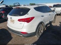 2013 Hyundai Santa Fe — photo 4 of 11 | VIN 5XYZU3LB1DG118830
