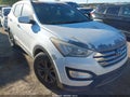 2013 Hyundai Santa Fe — photo 6 of 11 | VIN 5XYZU3LB1DG118830