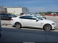 2014 Jaguar XF — photo 13 of 16 | VIN SAJWA0ES1EPU27186