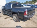 2014 Toyota Tacoma — photo 3 of 17 | VIN 5TFLU4EN9EX094925