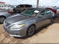 2018 Nissan Altima — photo 2 of 15 | VIN 1N4AL3AP9JC267362