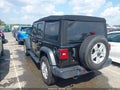 2018 Jeep Wrangler Unlimited — photo 3 of 16 | VIN 1C4HJXDN4JW324906