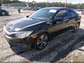 2016 Honda Civic — photo 2 of 17 | VIN 2HGFC1F39GH649912