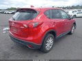 2014 Mazda CX-5 — photo 4 of 17 | VIN JM3KE2CY2E0309538