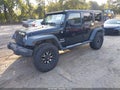 2013 Jeep Wrangler Unlimited — photo 2 of 16 | VIN 1C4BJWDGXDL637658