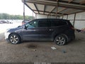 2015 Chevrolet Traverse — photo 14 of 18 | VIN 1GNKRJKD4FJ362802