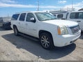 2007 GMC Yukon XL — photo 1 of 12 | VIN 1GKFK66847J325442