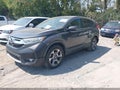 2017 Honda CR-V — photo 2 of 16 | VIN 2HKRW2H51HH606410
