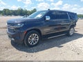 2023 Chevrolet Suburban — photo 2 of 17 | VIN 1GNSCFKDXPR517970