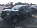 2014 Nissan Frontier — photo 2 of 16 | VIN 1N6AD0EV9EN707652