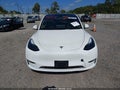 2025 Tesla Model Y — photo 10 of 14 | VIN 7SAYGAEE9SF235089