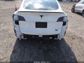2025 Tesla Model Y — photo 6 of 14 | VIN 7SAYGAEE9SF235089
