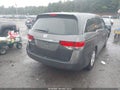 2014 Honda Odyssey — photo 4 of 16 | VIN 5FNRL5H68EB121890