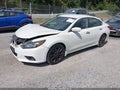 2016 Nissan Altima — photo 2 of 16 | VIN 1N4AL3AP2GC223342