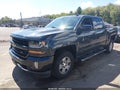 2018 Chevrolet Silverado 1500 — photo 2 of 16 | VIN 3GCUKREC9JG247257