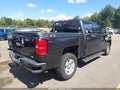 2018 Chevrolet Silverado 1500 — photo 4 of 16 | VIN 3GCUKREC9JG247257