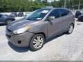 2013 Hyundai Tucson — photo 2 of 16 | VIN KM8JU3AC1DU730898
