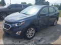 2018 Chevrolet Equinox — photo 2 of 18 | VIN 3GNAXHEV8JS557713