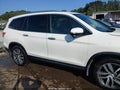 2017 Honda Pilot — photo 13 of 18 | VIN 5FNYF6H97HB022050