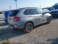 2014 BMW X5 — photo 4 of 16 | VIN 5UXKR0C50E0K49054