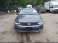 2015 Volkswagen Jetta — photo 13 of 15 | VIN 3VWD17AJ0FM319934