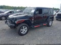 2018 Jeep Wrangler Unlimited — photo 2 of 17 | VIN 1C4HJXDG0JW108620