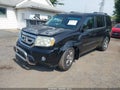 2011 Honda Pilot — photo 2 of 16 | VIN 5FNYF4H91BB089903