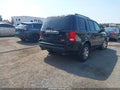 2011 Honda Pilot — photo 4 of 16 | VIN 5FNYF4H91BB089903